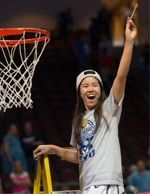 Rick Egan  |  The Salt Lake Tribune

Brigham Young Cougars guard Kylie Maeda (15) cuts down the net  as the Cougars defeated the San Francisco Dons 76-65, in the West Coast Conference Women's Basketball Championship game, at the Orleans Arena, in Las Vegas, Tuesday, March 10, 2015