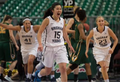 Rick Egan  |  The Salt Lake Tribune

Brigham Young Cougars forward Morgan Bailey (41),Kylie Maeda (15) and Makenzi Morrison (23) react at the buzzer, as the Cougars defeated the San Francisco Dons 76-65, in the West Coast Conference Women's Basketball Championship game, at the Orleans Arena, in Las Vegas, Tuesday, March 10, 2015