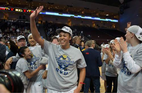 Rick Egan  |  The Salt Lake Tribune

Brigham Young Cougars guard Lexi Eaton (21) waves to the crowd after being named to the all tournament team, after defeating the San Francisco Dons 76-65, in the West Coast Conference Women's Basketball Championship game, at the Orleans Arena, in Las Vegas, Tuesday, March 10, 2015