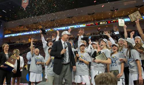 Rick Egan  |  The Salt Lake Tribune

Brigham Young Cougars celebrate after defeating the San Francisco Dons 76-65, in the West Coast Conference Women's Basketball Championship game, at the Orleans Arena, in Las Vegas, Tuesday, March 10, 2015
