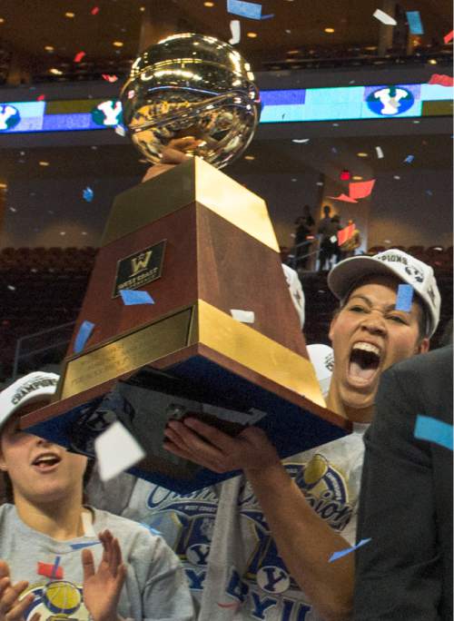 Rick Egan  |  The Salt Lake Tribune

Brigham Young Cougars forward Morgan Bailey (41) holds up the Championship trophy after BYU defeated the San Francisco Dons 76-65, in the West Coast Conference Women's Basketball Championship game, at the Orleans Arena, in Las Vegas, Tuesday, March 10, 2015