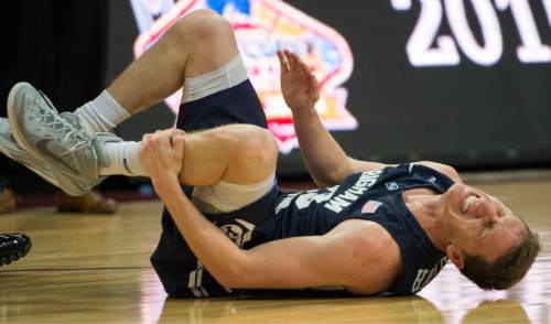 Rick Egan  |  The Salt Lake Tribune

Brigham Young Cougars guard Skyler Halford (23) grimaces in pain, after being injured, in the West Coast Conference championship game, at the Orleans Arena, in Las Vegas, Tuesday, March 10, 2015