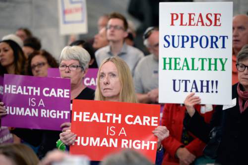 Al Hartmann  |  The Salt Lake Tribune 
The Utah Health Policy Project, hundreds of citizens and advocates of the governor's plan to expand Medicaid, Healthy Utah rally at noon Thursday March 5, 2015, inside the Capitol rotunda.