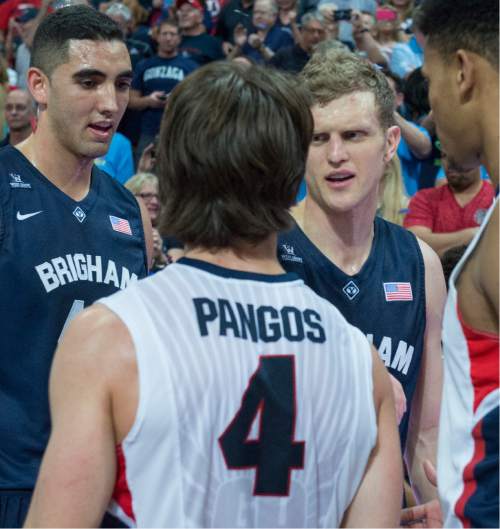 Rick Egan  |  The Salt Lake Tribune

Brigham Young Cougars Brigham Young Cougars forward Luke Worthington (41) and Tyler Haws (3) shake hands with Gonzaga Bulldogs guard Kevin Pangos (4) after the game, as Gonzaga defeated BYU, in the West Coast Conference championship game, at the Orleans Arena, in Las Vegas, Tuesday, March 10, 2015
