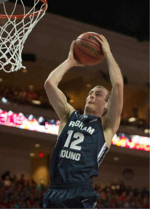 Rick Egan  |  The Salt Lake Tribune

Brigham Young forward Josh Sharp (12) grabs a rebound for the Cougars, in the West Coast Conference championship game, at the Orleans Arena, in Las Vegas, Tuesday, March 10, 2015