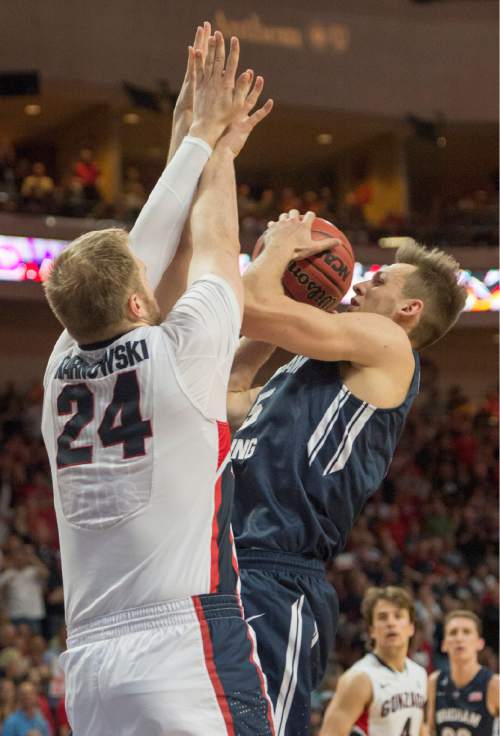 Rick Egan  |  The Salt Lake Tribune

Brigham Young Cougars guard Kyle Collinsworth (5) tries to get a shot off over Gonzaga Bulldogs center Przemek Karnowski (24), in the West Coast Conference championship game, BYU vs. Gonzaga, at the Orleans Arena, in Las Vegas, Tuesday, March 10, 2015