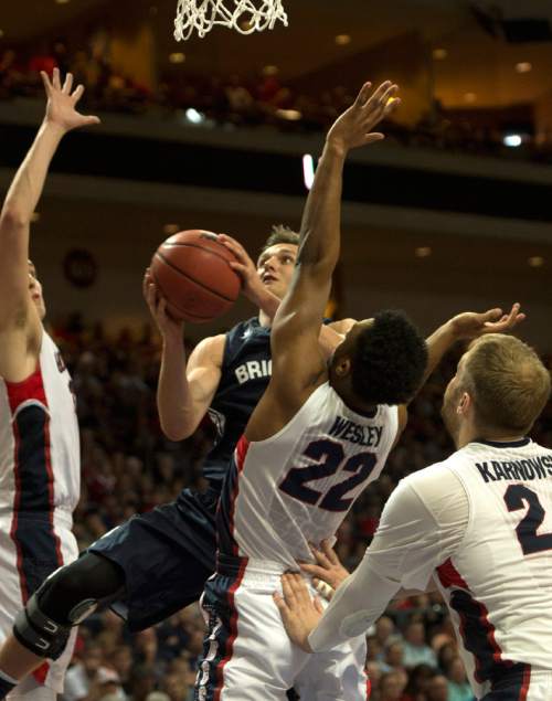 Rick Egan  |  The Salt Lake Tribune

Brigham Young Cougars guard Kyle Collinsworth (5) tries to get past Gonzaga Bulldogs guard Byron Wesley (22), in the West Coast Conference championship game, BYU vs. Gonzaga, at the Orleans Arena, in Las Vegas, Tuesday, March 10, 2015