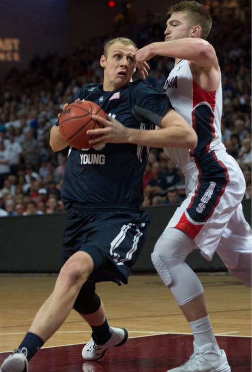 Rick Egan  |  The Salt Lake Tribune

Brigham Young Cougars guard Jake Toolson (15) takes the ball inside, as Gonzaga Bulldogs forward Domantas Sabonis (11) defends, in the West Coast Conference championship game, BYU vs. Gonzaga, at the Orleans Arena, in Las Vegas, Tuesday, March 10, 2015