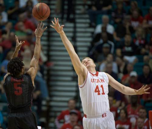 Rick Egan  |  The Salt Lake Tribune

Stanford Cardinal guard Chasson Randle (5) hits a 3-point shot, as he shoots over Utah Utes forward Jeremy Olsen (41), in Pac-12 Basketball Championship action Utah vs. Stanford, at the MGM Arena, in Las Vegas, Thursday, March 12, 2015.