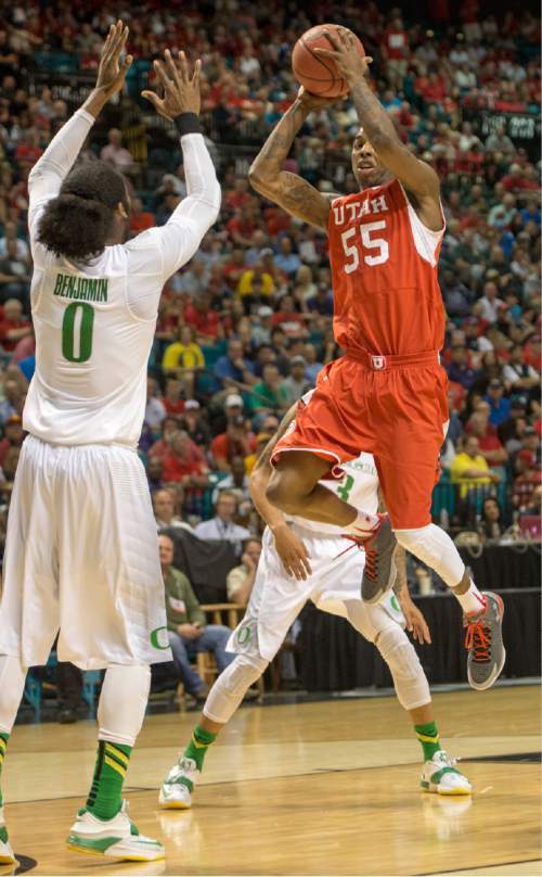 Rick Egan  |  The Salt Lake Tribune

Utah Utes guard Delon Wright (55) takes the ball up the middle as Oregon forward Dwayne Benjamin (0) defends for the Ducks, in Pac-12 Basketball Championship action Utah vs. Oregon, at the MGM Arena, in Las Vegas, Friday, March 13, 2015.