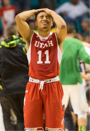 Rick Egan  |  The Salt Lake Tribune

Utah guard Brandon Taylor (11) react as the Oregon Ducks defeat the Utes with a 3-point shot in the final seconds  to win 67-64, in Pac-12 Basketball Championship action Utah vs. Oregon, at the MGM Arena, in Las Vegas, Friday, March 13, 2015.