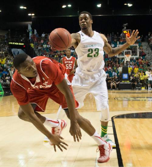 Rick Egan  |  The Salt Lake Tribune

Utah Utes guard/forward Dakarai Tucker (14) is fouled by Oregon Ducks forward Elgin Cook (23) in the final minutes of the game, the Ducks went on to win 67-64, in Pac-12 Basketball Championship action Utah vs. Oregon, at the MGM Arena, in Las Vegas, Friday, March 13, 2015.