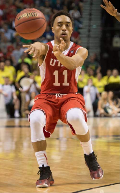 Rick Egan  |  The Salt Lake Tribune

Utah Utes guard Brandon Taylor (11) tosses a pass in Pac-12 Basketball Championship action Utah vs. Oregon, at the MGM Arena, in Las Vegas, Friday, March 13, 2015.