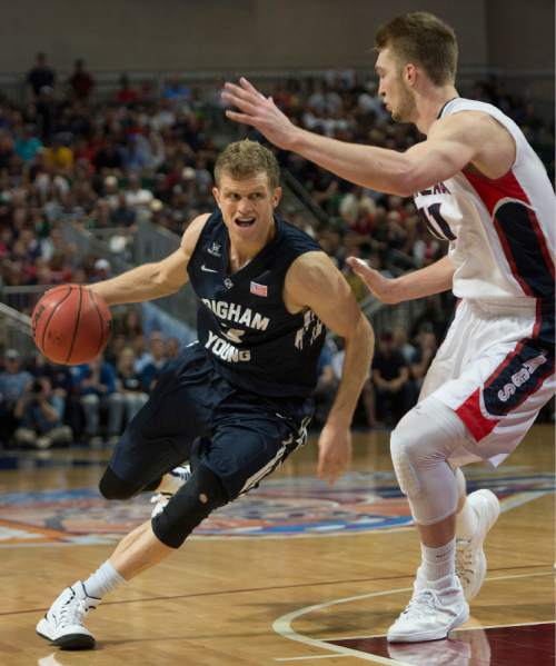 Rick Egan  |  The Salt Lake Tribune

Brigham Young Cougars guard Tyler Haws (3) gets past Gonzaga Bulldogs forward Domantas Sabonis (11) defends, in the West Coast Conference championship game, BYU vs. Gonzaga, at the Orleans Arena, in Las Vegas, Tuesday, March 10, 2015