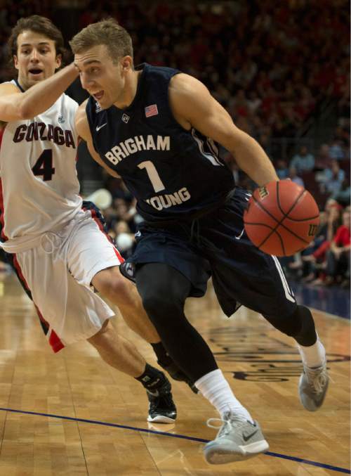 Rick Egan  |  The Salt Lake Tribune

Brigham Young Cougars guard Chase Fischer (1) get past Gonzaga Bulldogs guard Kevin Pangos (4), in the West Coast Conference championship game, BYU vs. Gonzaga, at the Orleans Arena, in Las Vegas, Tuesday, March 10, 2015