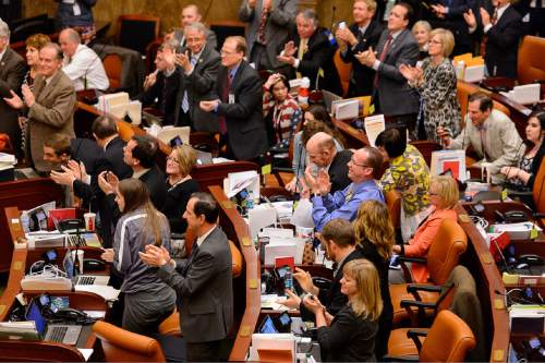 Trent Nelson  |  The Salt Lake Tribune
Legislators applaud in the House Chamber at the close of the Utah legislative session at the State Capitol Building in Salt Lake City, Thursday March 12, 2015.