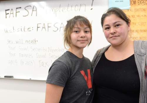 Steve Griffin  |  The Salt Lake Tribune

Shantell Martinez with her mother Casey Sallazar after they fill out Shantell's FAFSA form during a FAFSA Open House put on by the Utah System of Higher Education at Granger High School in West Valley City, Wednesday, March 11, 2015.