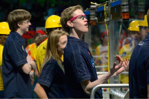 Leah Hogsten  |  The Salt Lake Tribune
Ravens Robotics team driver from Waterford School, Justin Dover looks incredulously at the amount of points racked up by his team's competitors during the annual Utah Regional FIRST Robotics Competition where 53 high school teams from 11 states and Canada compete to see whose robot can stack and sort recyclable materials the fastest, Saturday, March 14, 2015 at the Maverick Center.