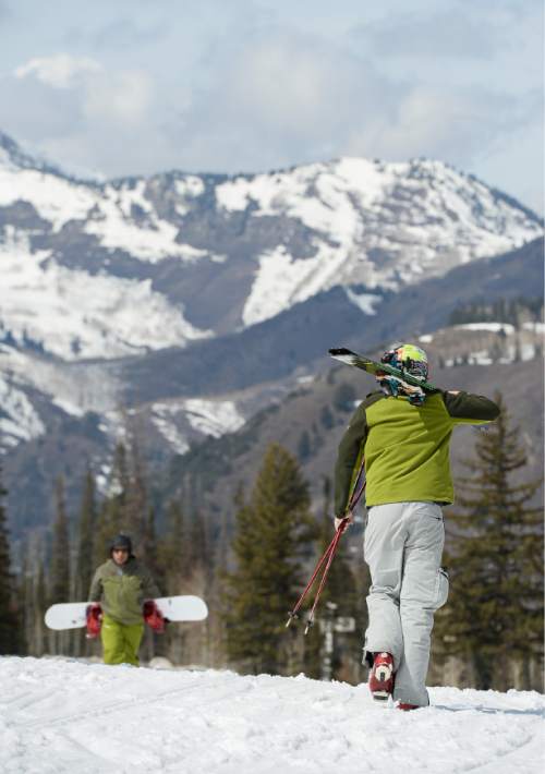 Francisco Kjolseth  |  The Salt Lake Tribune 
The mountains around Solitude Mountain Resort show more bare spots than average as skiers and boarders enjoy spring skiing conditions on Wednesday, March 18, 2015.