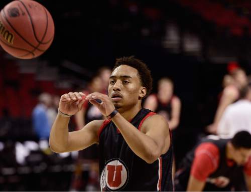 Scott Sommerdorf   |  The Salt Lake Tribune
Utah Utes guard Brandon Taylor (11), takes a pass during Utah's practice session at the Moda Center in Portland, Wednesday, March 18, 2015. The Utes will play Stephen F. Austin Thursday.