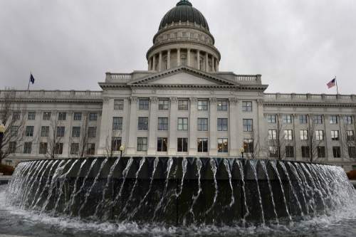 Scott Sommerdorf   |  The Salt Lake Tribune
An approaching storm blows the waters in the Capitol fountain sideways, Wednesday, Feb. 19, 2014.
