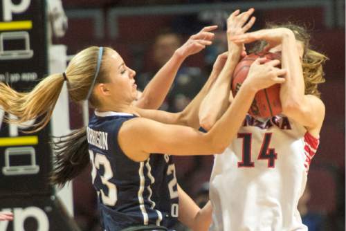 Rick Egan  |  The Salt Lake Tribune

Brigham Young Cougars guard Makenzi Morrison (23) goes after the ball as Gonzaga Bulldogs forward Sunny Greinacher (14) tries to keep control as the Lady Cougars upset the Gonzaga Bulldogs in the West Coast Conference Basketball Championships at the Orleans Arena in Las Vegas,  Monday, March 9, 2015.
