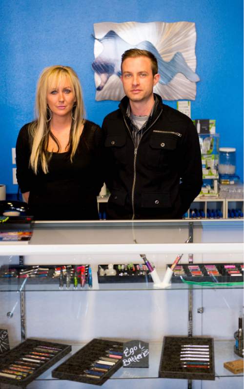 Trent Nelson  |  The Salt Lake Tribune
Jen Littlefield and Lewie Lambros are the ownders of Vapor Dreams in Bountiful. The city informed the owners of four electronic cigarette store through a Dec. 23 letter that their business licenses will not be renewed for calendar year 2014. The letter says the stores are considered a "retail tobacco specialty business" and violate a state zoning law. The owners say they confirmed with the city that the locations were legal and that they now face financial hardship. Friday December 27, 2013.