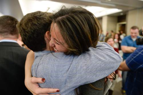 Francisco Kjolseth  |  The Salt Lake Tribune 
University of Utah medical students Marina De Amorim gets a big hug from fellow graduate Christopher Bossart as they join medical graduate students across the country for Match Day, to find out where they will do their residency.