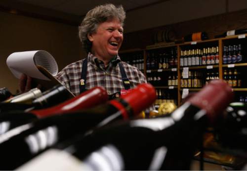 Tribune file photo
In this 2008 photo, Ron Harris, former manager of Salt Lake City Metro Wine Store on 255 S. 300 East, shares a laugh with a customer.