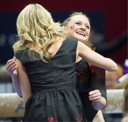 Rick Egan  |  The Salt Lake Tribune

Maddy Stover smiles after competing on the beam, in the Pac-12 Gymnastics Championships at the Huntsman Center, Saturday, March 21, 2015.