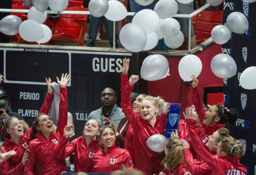 Rick Egan  |  The Salt Lake Tribune

The Lady Utes celebrate their first place finish in the Pac-12 Gymnastics Championships at the Huntsman Center, Saturday, March 21, 2015.