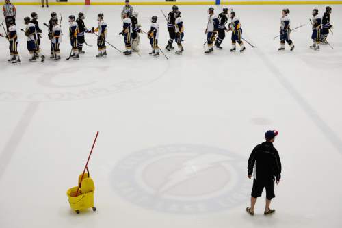 Francisco Kjolseth  |  The Salt Lake Tribune 
One game finishes up before crews prep the ice for another game of Division II club hockey on Salt Lake City's Utah Ice Sheet for the ACHA National Championships.