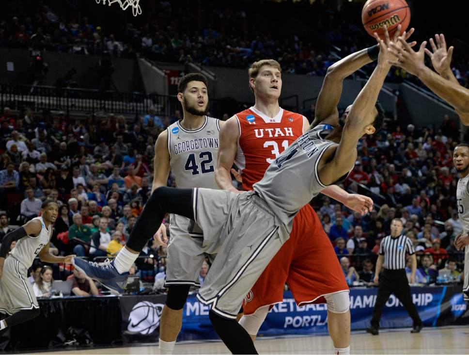 Scott Sommerdorf   |  The Salt Lake Tribune
Utah Utes center Dallin Bachynski (31) watches as Georgetown Hoyas forward Isaac Copeland (11) gets sideways while grabbing for a rebound during second half play. Utah defeated Georgetown 75-64 to advance to the "Sweet Sixteen", Saturday, March 21, 2015.