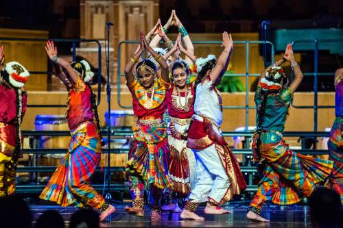 Chris Detrick  |  The Salt Lake Tribune
Members of the Kargi Kala Kendra Indian Classical Dance School, of Sandy, directed by Sudha Kargi, perform the dance "Krishna Nee Begane," during the annual Interfaith Musical Tribute at the Mormon Tabernacle Sunday March 22, 2015.  The Tribute originated the Sunday before the 2002 Winter Olympic Games as a time of prayerful reflection for religious leaders and others preparing to welcome the world to Salt Lake City. It returns every year on the anniversary of the Games and is the signature event of Interfaith Month in Utah.