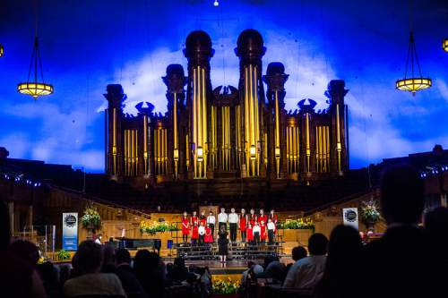 Chris Detrick  |  The Salt Lake Tribune
Members of The Family Federation for World Peace and Unification Children's Choir perform during the annual Interfaith Musical Tribute at the Mormon Tabernacle Sunday March 22, 2015.  The Tribute originated the Sunday before the 2002 Winter Olympic Games as a time of prayerful reflection for religious leaders and others preparing to welcome the world to Salt Lake City. It returns every year on the anniversary of the Games and is the signature event of Interfaith Month in Utah.