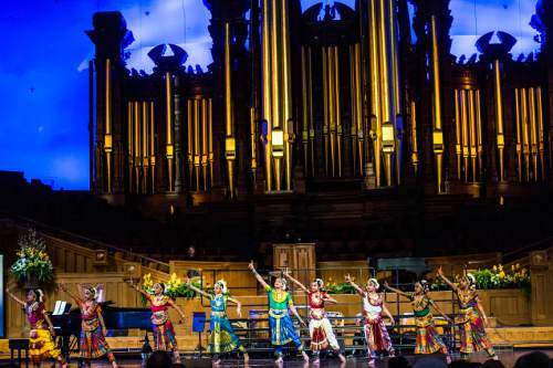 Chris Detrick  |  The Salt Lake Tribune
Members of the Kargi Kala Kendra Indian Classical Dance School, of Sandy, directed by Sudha Kargi, perform the dance "Krishna Nee Begane," during the annual Interfaith Musical Tribute at the Mormon Tabernacle Sunday March 22, 2015.  The Tribute originated the Sunday before the 2002 Winter Olympic Games as a time of prayerful reflection for religious leaders and others preparing to welcome the world to Salt Lake City. It returns every year on the anniversary of the Games and is the signature event of Interfaith Month in Utah.