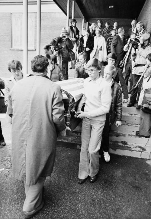 Tribune file photo

John Singer's casket leaving the Larkin Mortuary in Salt Lake City, Utah. Singer was buried near his farm in the Marion Cemetery in Marion, Utah, on Jan. 22, 1979. The two ladies immediately behind the casket are Vickie Singer, his first wife (left) and Shirley Singer, his second wife (right).