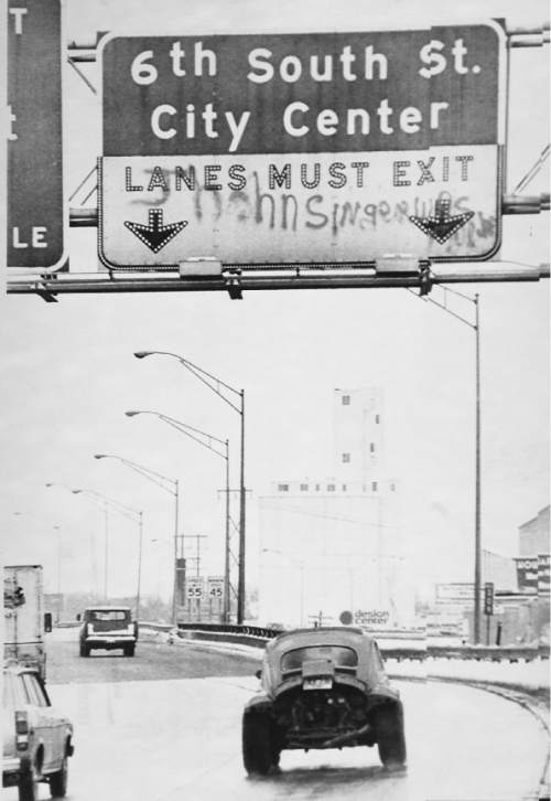 Tribune file photo

In this 1979 photo, an overpass sign on the outskirts of Salt Lake City shows graffiti saying, "John Singer was murdered." Singer was shot when he aimed  gun at uniformed officers who were attempting to arrest him on a contempt of court charge.