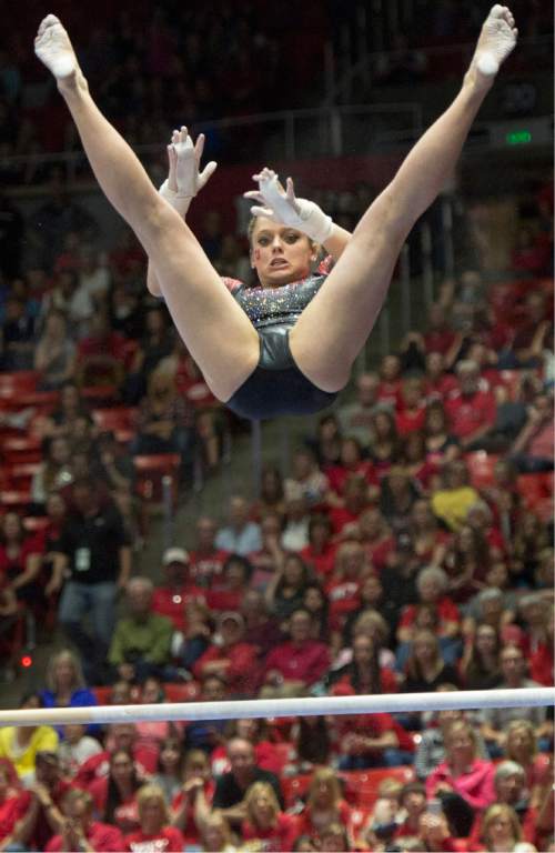 Rick Egan  |  The Salt Lake Tribune

Breanna Hughes competes on the bars for the Utes, in the Pac-12 Gymnastics Championships at the Huntsman Center, Saturday, March 21, 2015.