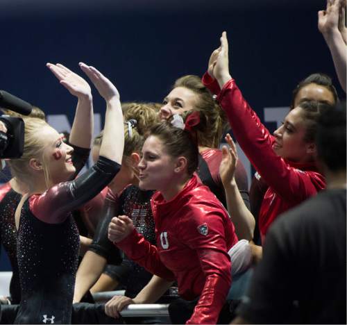 Rick Egan  |  The Salt Lake Tribune

The Lady Utes congratulate Georgia Dabritz after she competed on the beam, in the Pac-12 Gymnastics Championships at the Huntsman Center, Saturday, March 21, 2015.