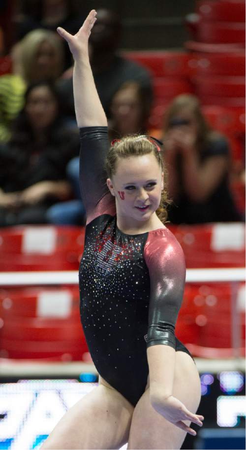 Rick Egan  |  The Salt Lake Tribune

Maddy Stover smiles as she competes on the beam, in the Pac-12 Gymnastics Championships at the Huntsman Center, Saturday, March 21, 2015.