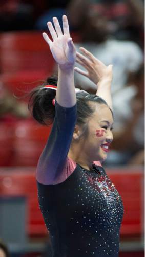 Rick Egan  |  The Salt Lake Tribune

Kari Lee smiles after competing on the Beam for Utah, in the Pac-12 Gymnastics Championships at the Huntsman Center, Saturday, March 21, 2015.