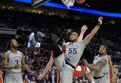 Scott Sommerdorf   |  The Salt Lake Tribune
Georgetown Hoyas guard Jabril Trawick (55) is off balance after going hard for a rebound  during second half play. Utah defeated Georgetown 75-64 to advance to the "Sweet Sixteen", Saturday, March 21, 2015.