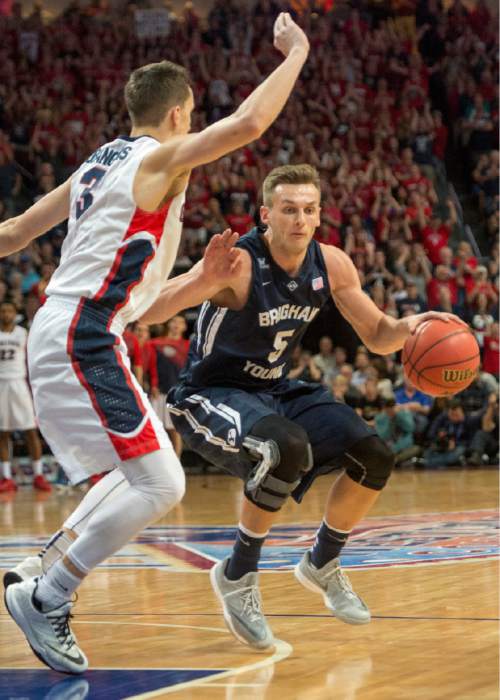 Rick Egan  |  The Salt Lake Tribune

Brigham Young Cougars guard Kyle Collinsworth (5) tries to get past Gonzaga Bulldogs guard Kyle Dranginis (3), in the West Coast Conference championship game, BYU vs. Gonzaga, at the Orleans Arena, in Las Vegas, Tuesday, March 10, 2015