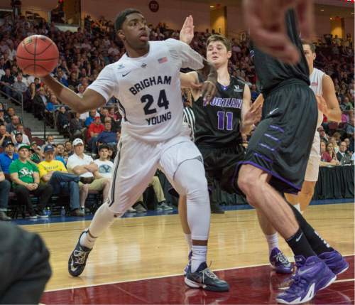 Rick Egan  |  The Salt Lake Tribune

Brigham Young Cougars guard Frank Bartley IV (24) passes the ball, as Portland Pilots guard Bobby Sharp (11) defends, in West Coast Conference Basketball Championship action, BYU vs. Portland, at the Orleans Arena in Las Vegas, Monday, March 9, 2015.