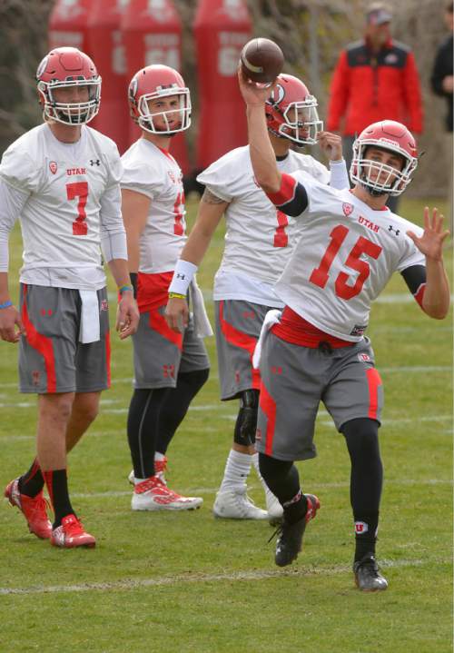 Leah Hogsten  |  The Salt Lake Tribune
Quarterback Chase Hansen fires off a pass as the University of Utah football team held their first spring practice, Tuesday, March 24, 2015.
