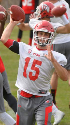 Leah Hogsten  |  The Salt Lake Tribune
Quarterback Chase Hansen fires off a pass as the University of Utah football team held their first spring practice, Tuesday, March 24, 2015.