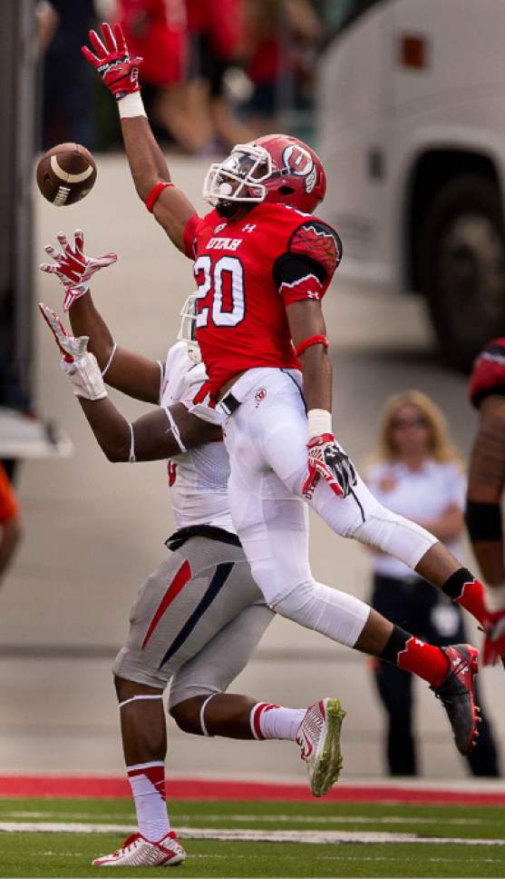 Trent Nelson  |  The Salt Lake Tribune
Utah Utes defensive back Marcus Williams (20) reaches out for the ball, but Fresno State Bulldogs wide receiver Greg Watson (10) catches it and runs for a touchdown, as Utah hosts Fresno State, college football at Rice-Eccles Stadium Saturday September 6, 2014.