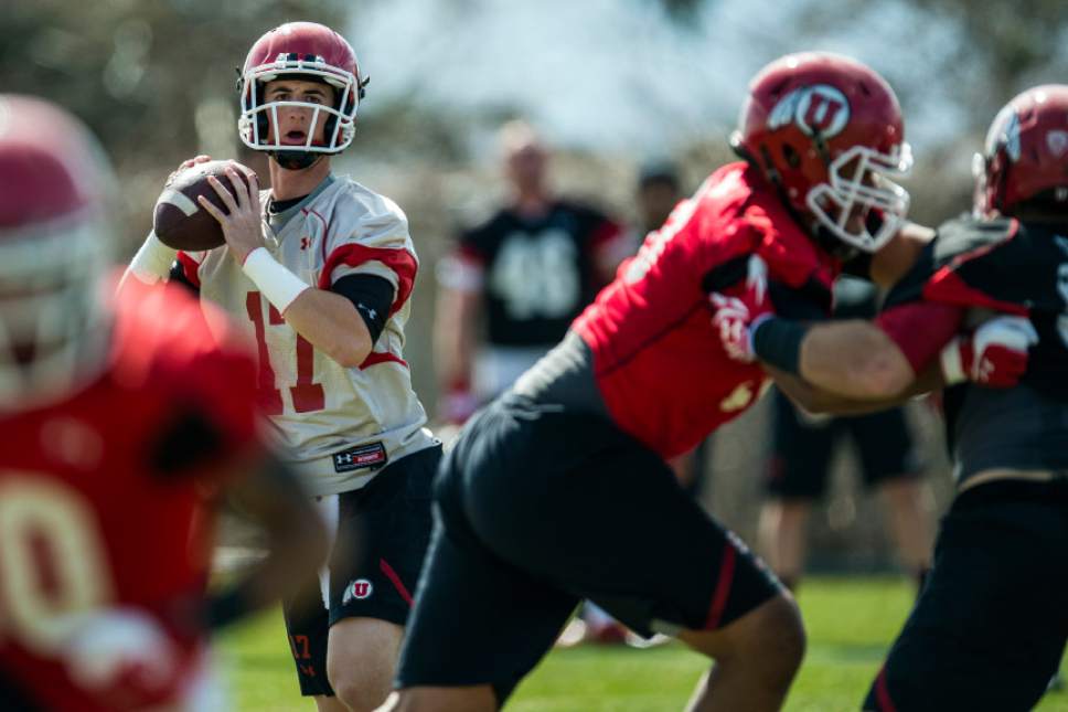 Chris Detrick  |  The Salt Lake Tribune
Utah quarterback Conner Manning looks to pass the ball during a practice at Spence and Cleone Eccles Football Center Thursday March 20, 2014.