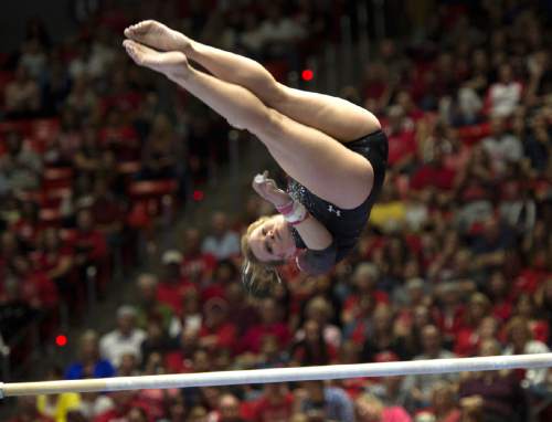 Rick Egan  |  The Salt Lake Tribune

Tory Wilson competes on the bars for the Utes, in the Pac-12 Gymnastics Championships at the Huntsman Center, Saturday, March 21, 2015.